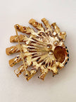 Designer pauw broche