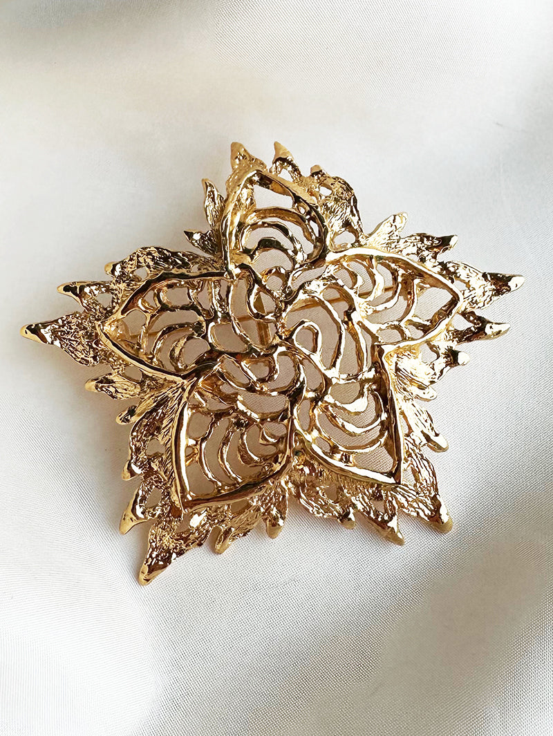 Grote vergulde designer broche