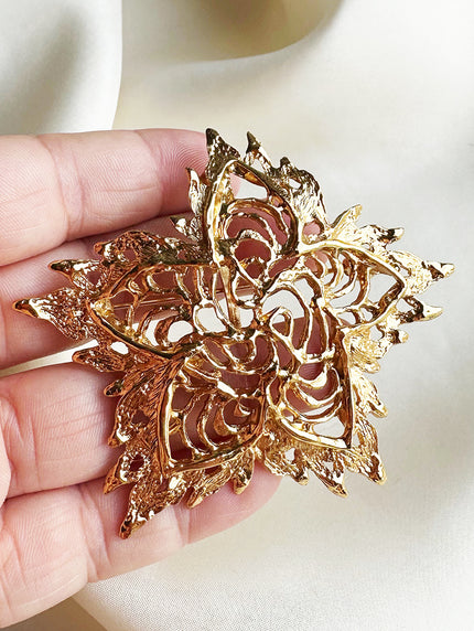 Grote vergulde designer broche