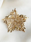 Grote vergulde designer broche