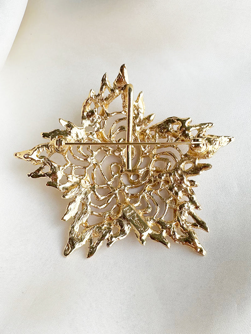 Grote vergulde designer broche