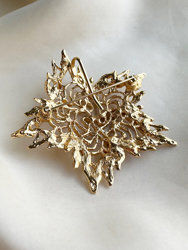 Grote vergulde designer broche