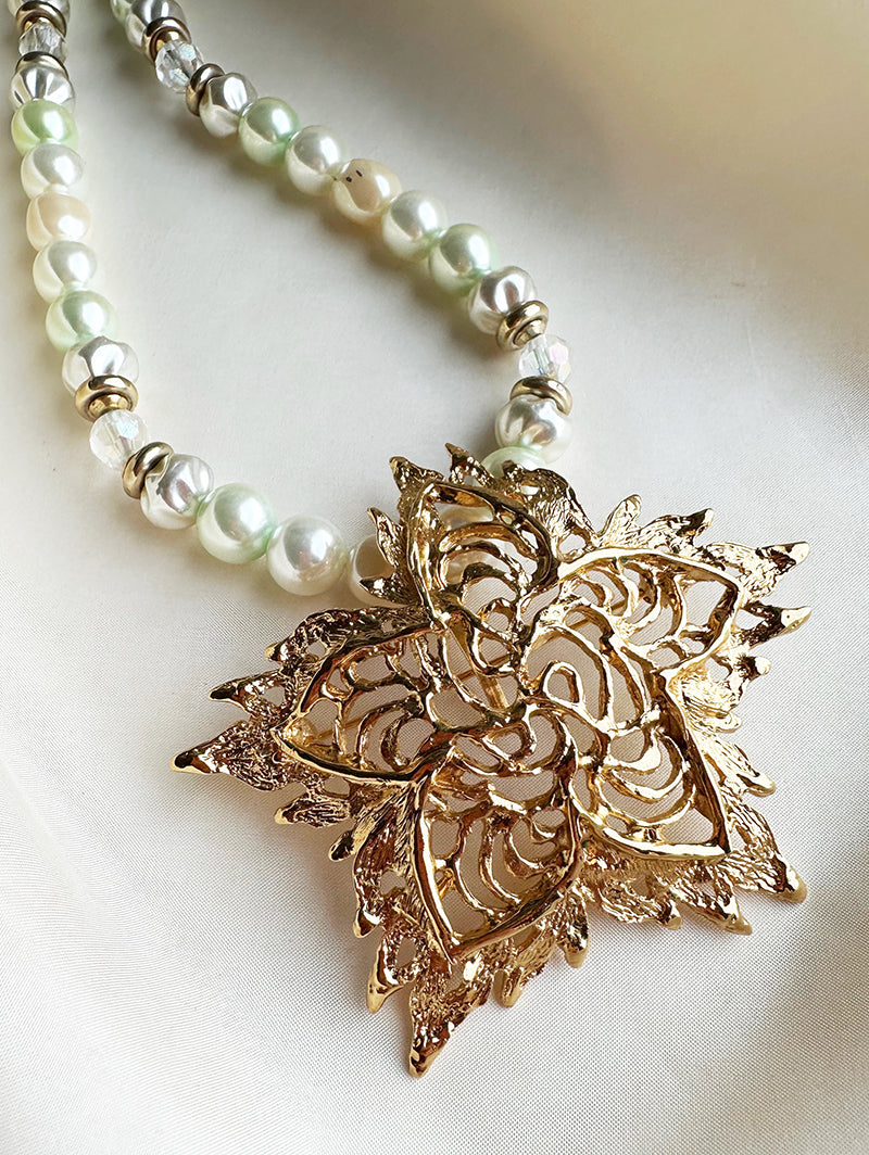 Grote vergulde designer broche
