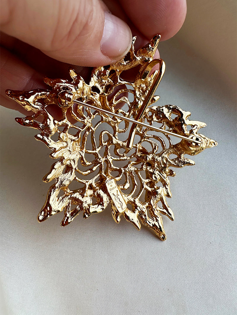 Grote vergulde designer broche