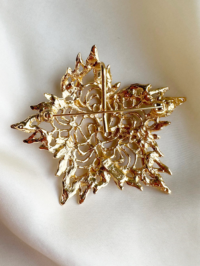 Grote vergulde designer broche