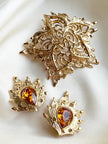 Grote vergulde designer broche
