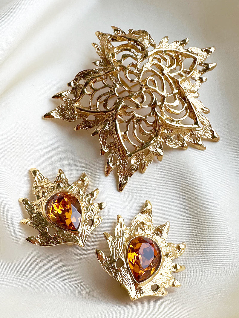 Grote vergulde designer broche