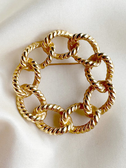 Vergulde ronde broche