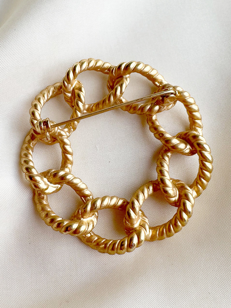 Vergulde ronde broche