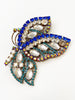 Blauwe kristalglazen vlinder broche