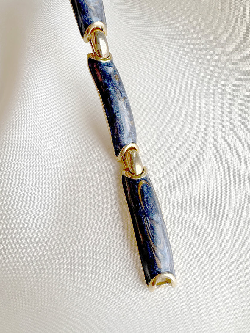 Grijze geëmailleerde armband