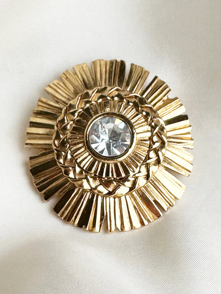 Vergulde designer broche
