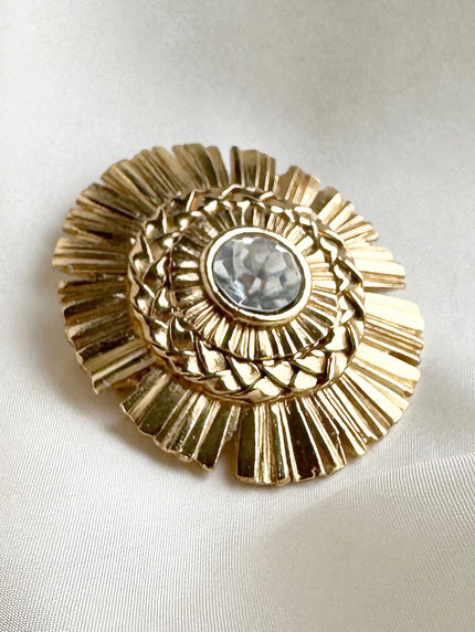 Vergulde designer broche