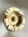 Vergulde designer broche
