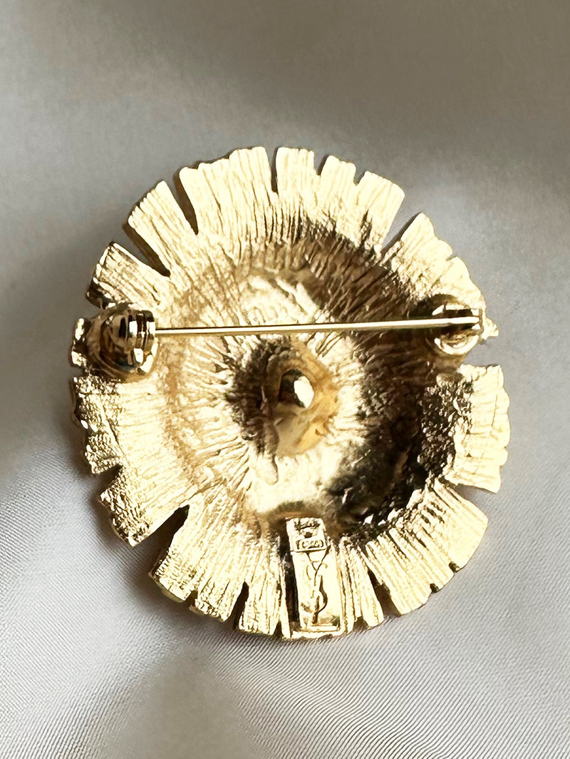 Vergulde designer broche