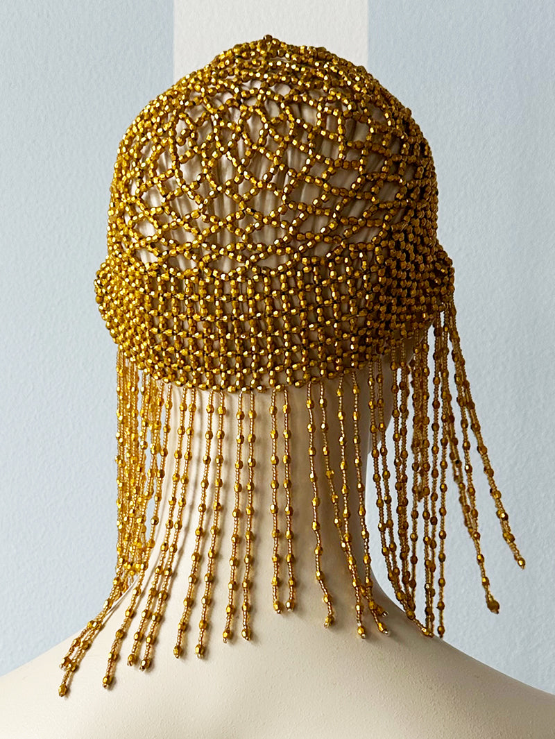 Geel/gouden mutsje van kralen