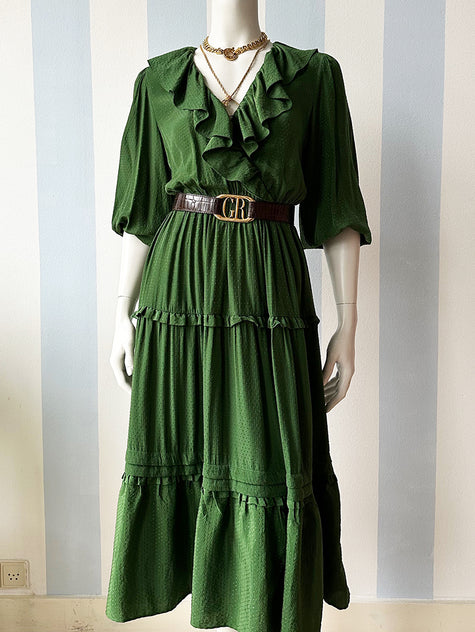 Groene strokenjurk met volants
