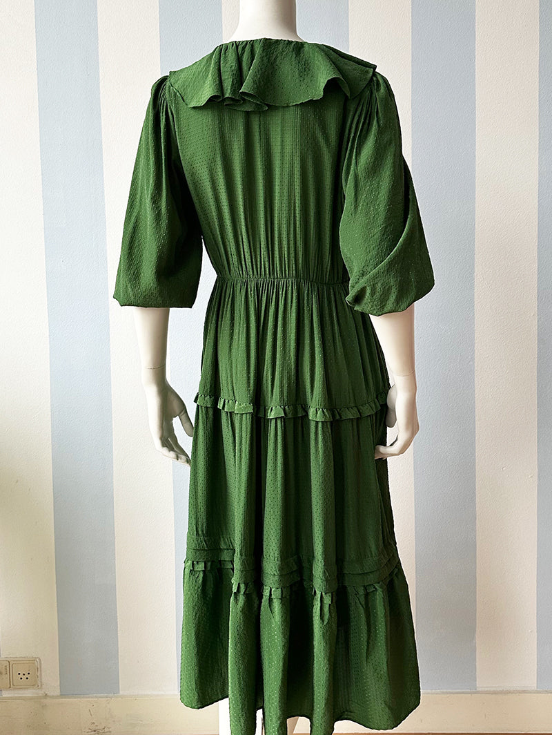 Groene strokenjurk met volants