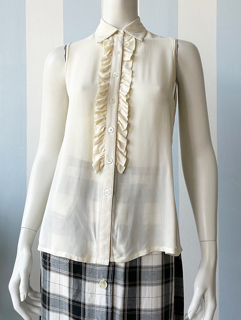 Witte designer roezeltop