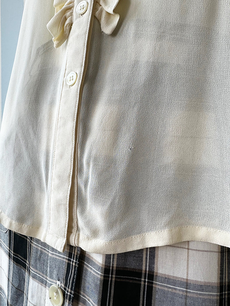 Witte designer roezeltop