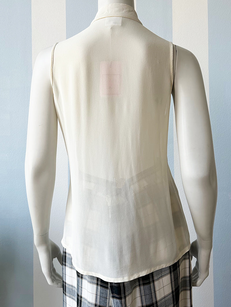 Witte designer roezeltop