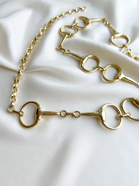 Gouden metalen horsebit ceintuur