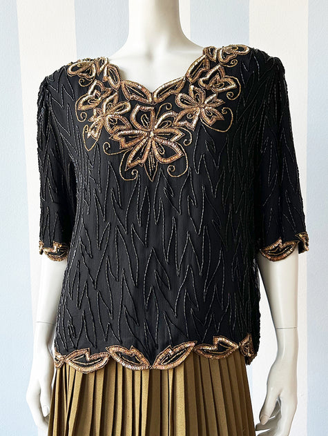 Zijden top met kraaltjes