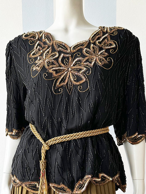 Zijden top met kraaltjes