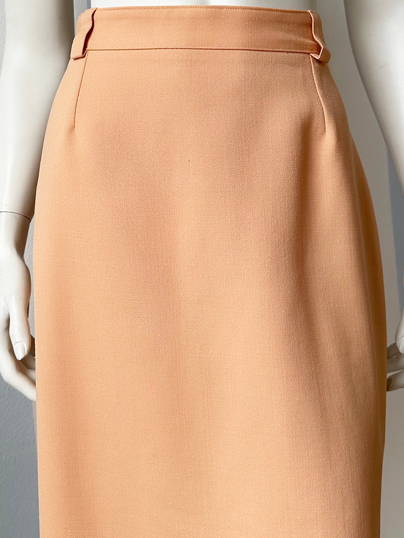 Pasteloranje scheerwollen kokerrokje