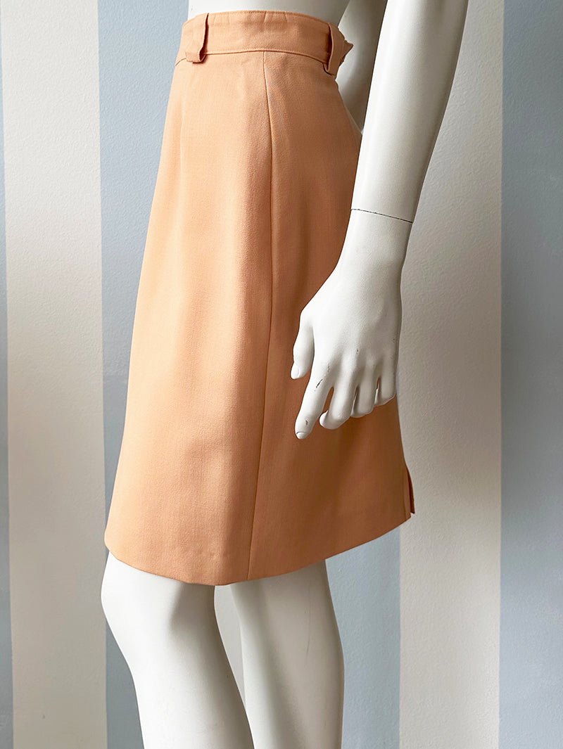 Pasteloranje scheerwollen kokerrokje