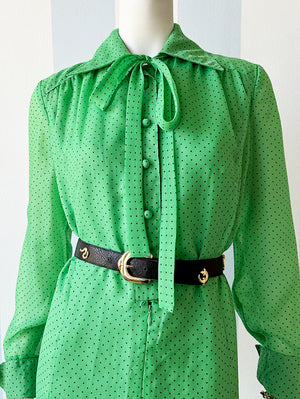 Groene polkadot jurk