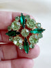 Groene strass broche