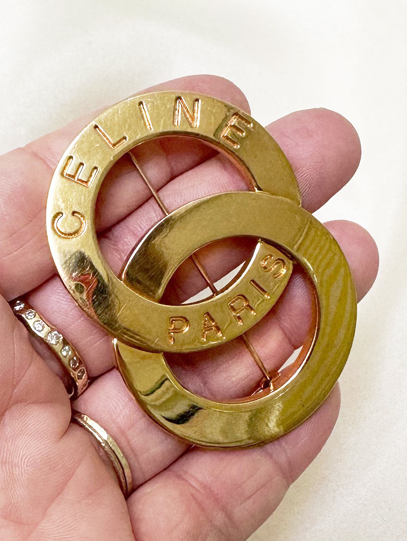 Grote vergulde designer broche