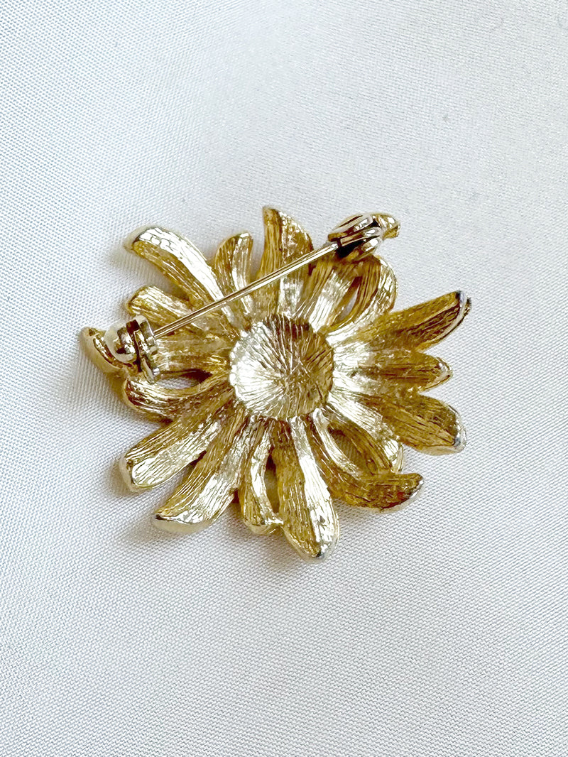 Gouden bloem broche