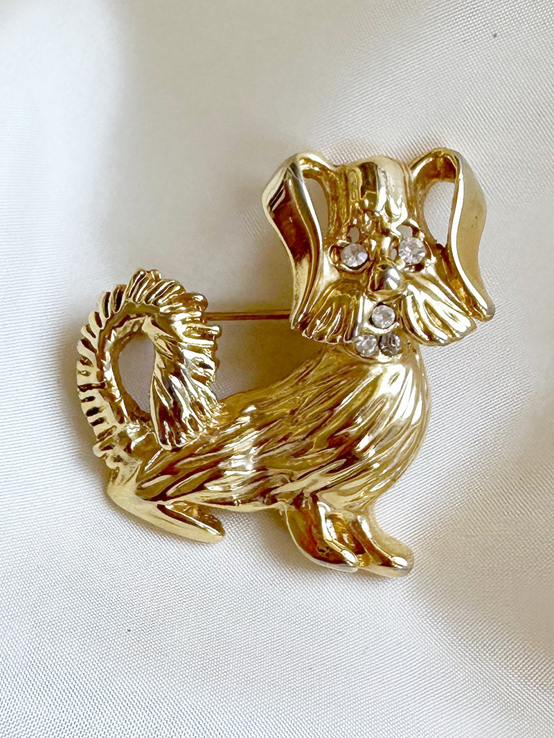 Gouden hondje broche