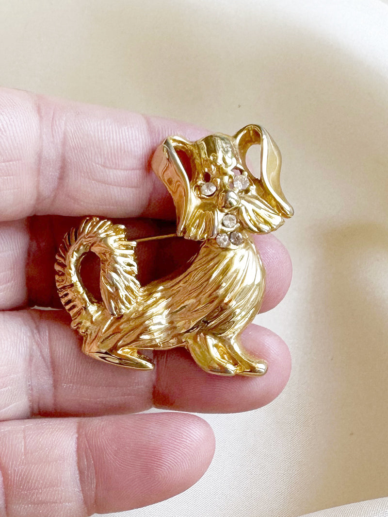 Gouden hondje broche