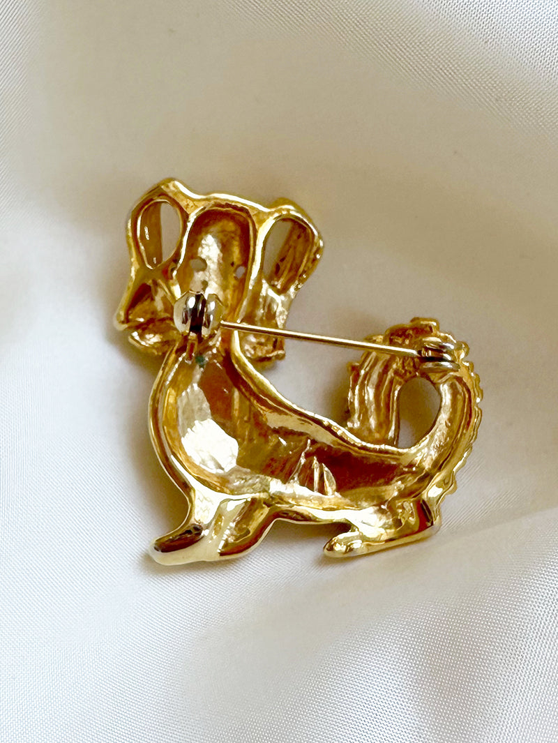 Gouden hondje broche