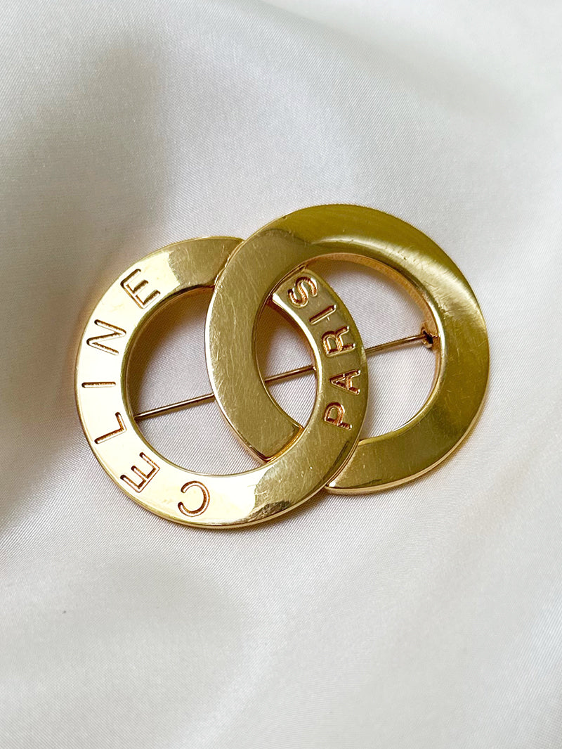 Grote vergulde designer broche