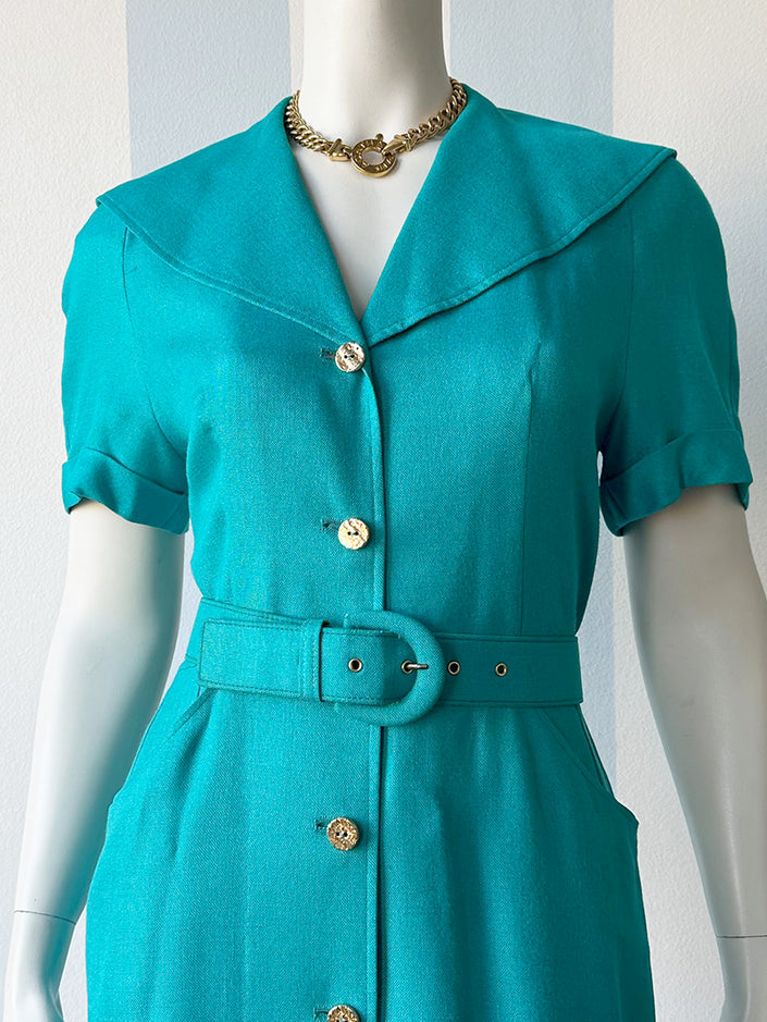 Turquoise doorknoopjurk