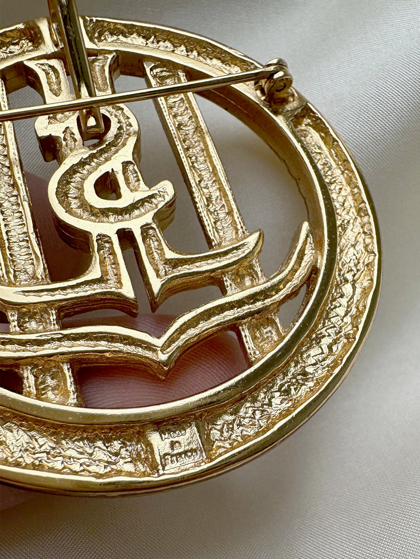 Vergulde designer broche