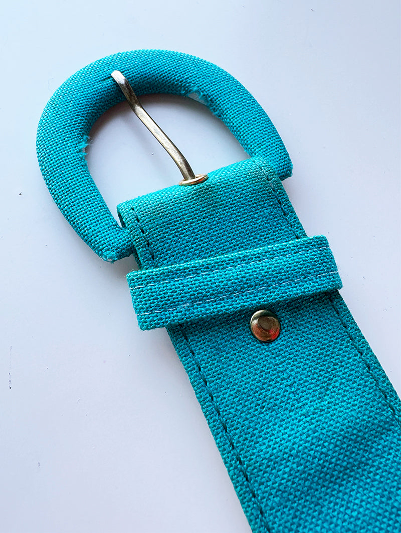 Turquoise doorknoopjurk
