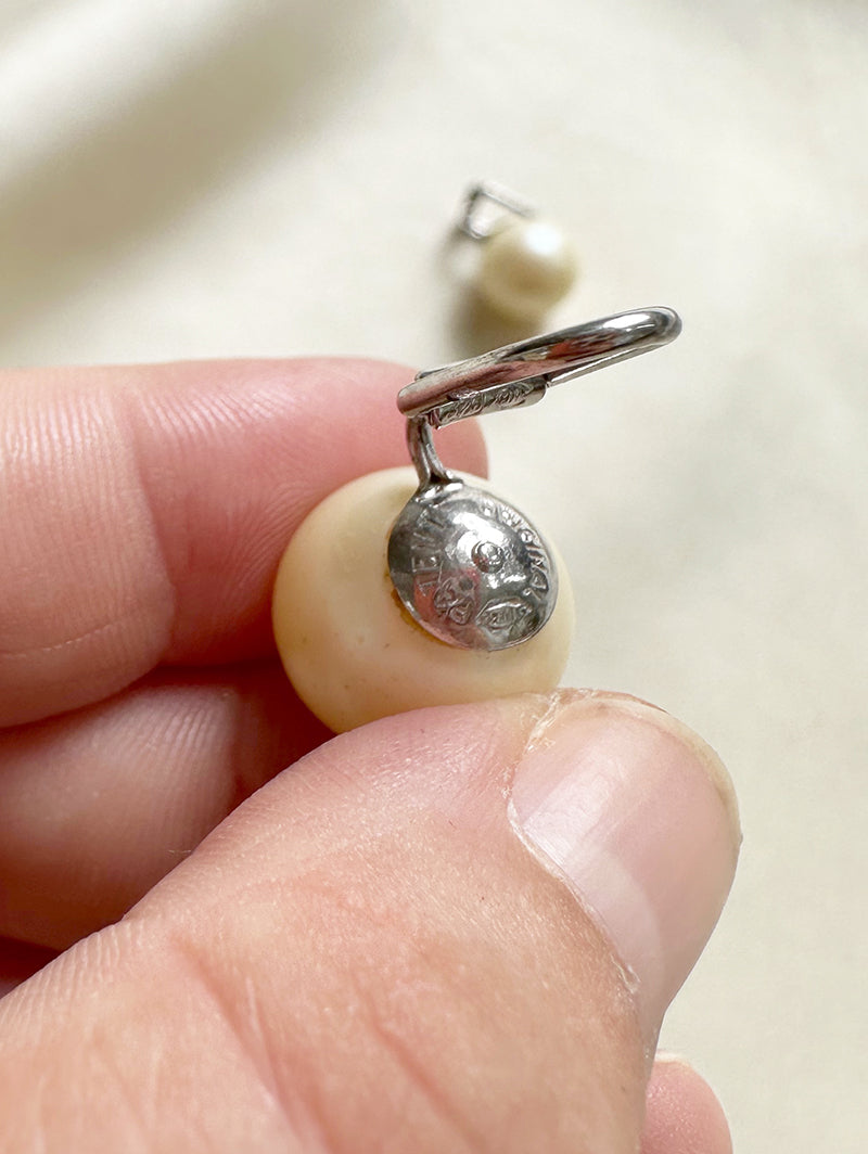 Zilveren parel clip oorbellen