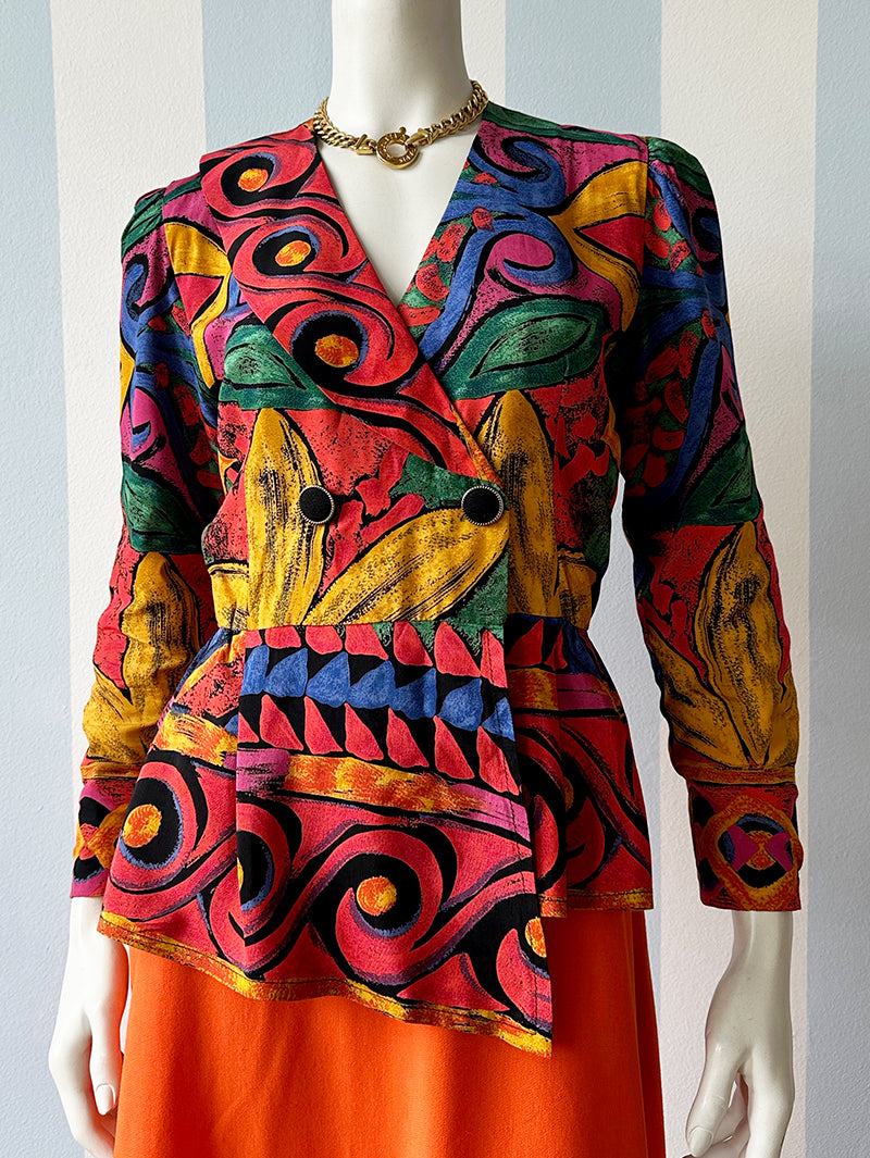 Double-breasted peplum overslagblouse