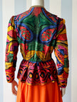 Double-breasted peplum overslagblouse