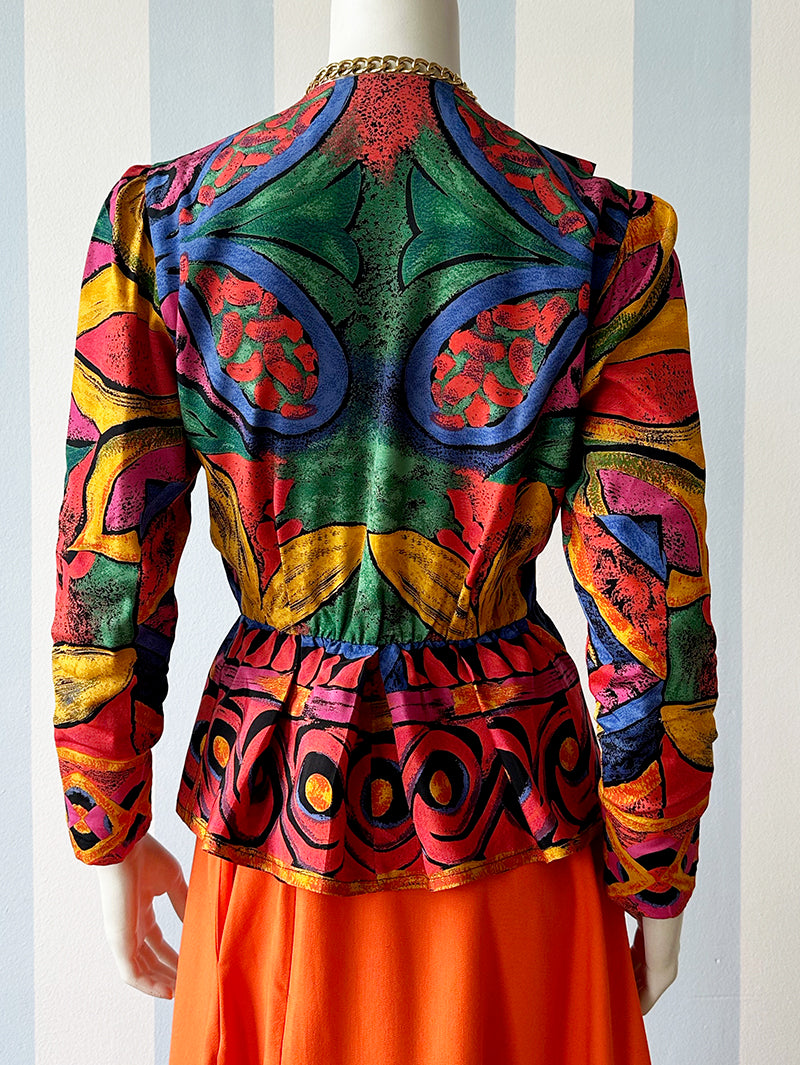 Double-breasted peplum overslagblouse