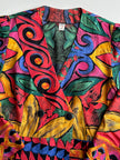 Double-breasted peplum overslagblouse