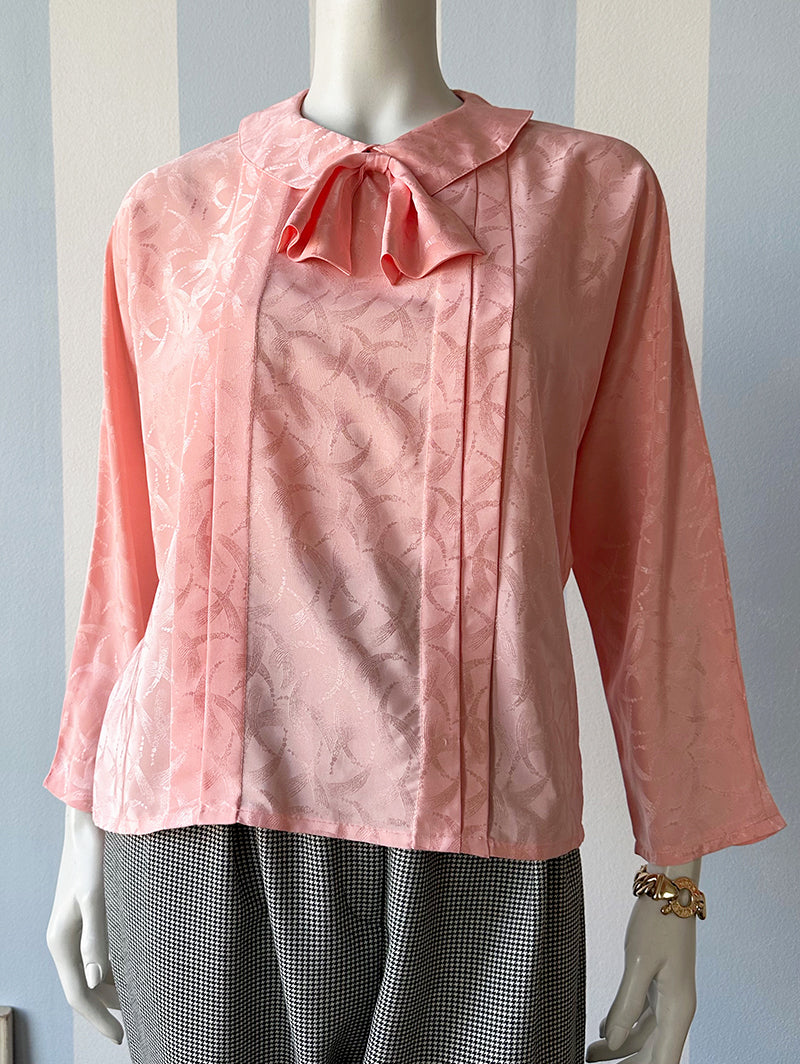 Roze strikblouse