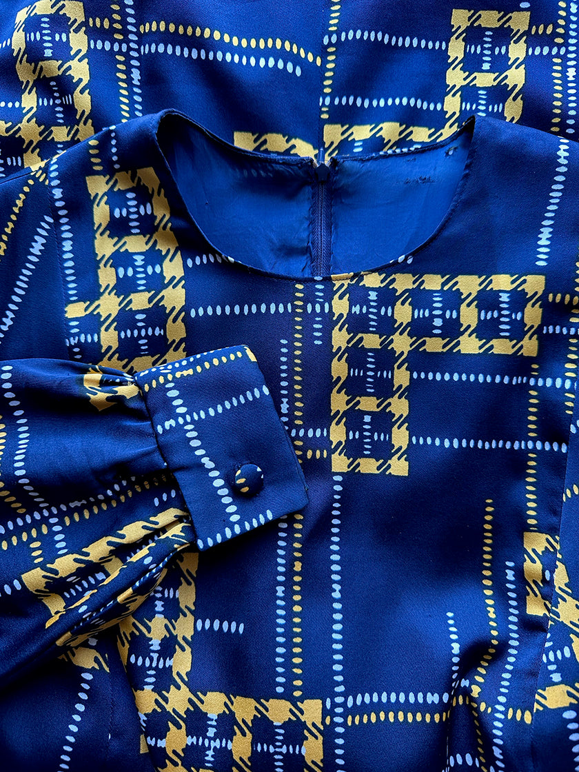 Geruite donkerblauwe 70s jurk