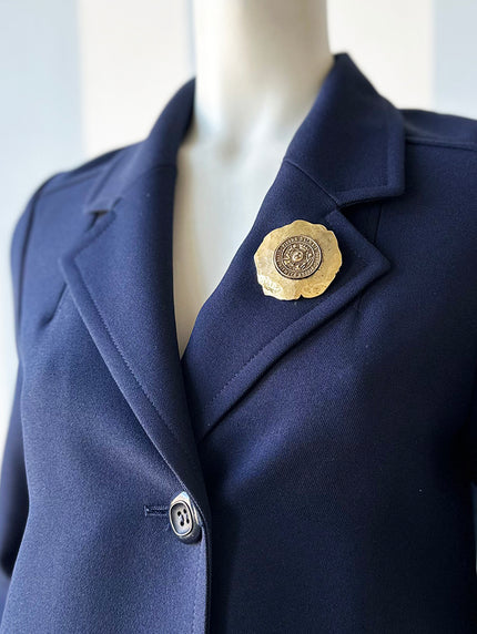 Grote vergulde broche