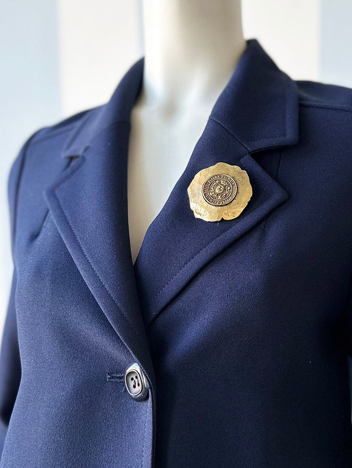 Grote vergulde broche